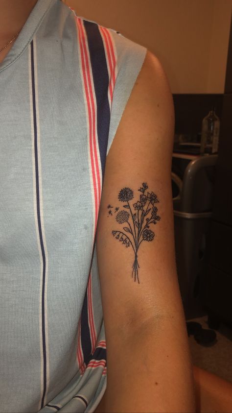 bouquet of flowers tattoo Tattoo Of Bouquet Of Flowers, Flower On Bicep Tattoo, Bicep Tattoo Women Flower, Bouquet Of Different Flowers Tattoo, Bicep Bouquet Tattoo, Flower Bouquet Tattoo Bicep, Wildflower Tattoo Bicep, Degrassi Tattoo, Flower Tattoos Bicep