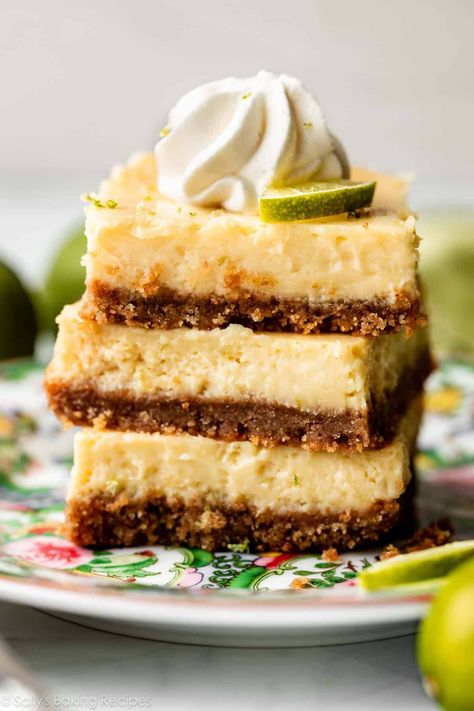 You're going to love these key lime pie bars, a handheld square version of my favorite key lime pie recipe. Cream cheese adds the most delightful cheesecake flavor, and a buttery graham cracker crust is a wonderful base for the tangy lime filling. You will fall in love with these zesty, easy-to-make bars! Recipe on sallysbakingaddiction.com Easy Key Lime Pie, Cookout Desserts, Key Lime Bars, Key Lime Pie Bars, Key Lime Pie Easy, Lime Desserts, Keylime Pie Recipe, Lime Bars, Lime Cheesecake