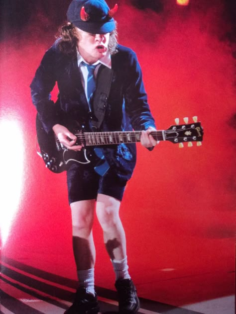 Angus Young by LilyLondon9 Acdc Outfit, Acdc Guitar, Acdc Live, Acdc Angus Young, Dc Costumes, Malcolm Young, Acdc Angus, Bon Scott, Rock Band Posters