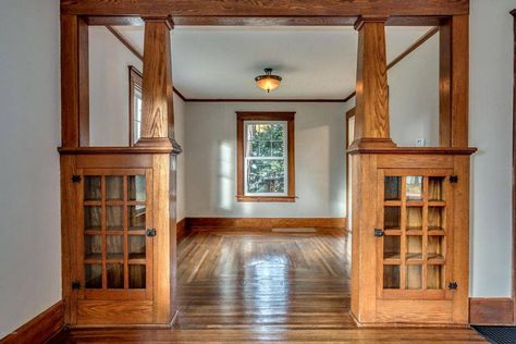 New Build Craftsman Style Interior, Craftsman Pillars Interior, Craftsman Style Archway, 1900s Craftsman Style Homes, Arts And Craftsman Style Interiors, Craftsman Style Built Ins Bookcases, Craftsman Built In Bookshelves, Craftsman Room Divider, Craftsman Style Office