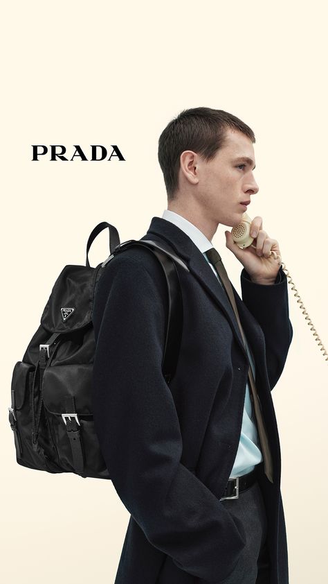 The season's new formal attire combines sporty details, contrasting colors, and modern geometries. Discover the latest Men's Collection. Prada Aesthetic, Evil Children, Prada Re Edition, New York Outfits, Look Formal, Messenger Bag Backpack, Luggage Bags Travel, Custom Belt, Mens Travel Bag