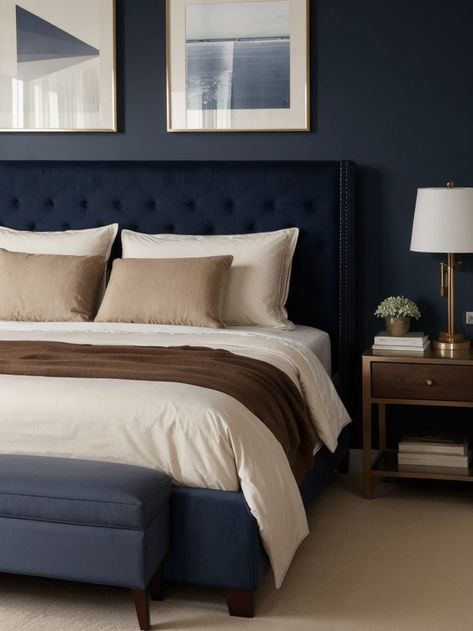 Achieve a sophisticated navy blue and brown aesthetic by incorporating a tufted navy headboard and pairing it with wooden nightstands. Add warmth to the space with bronze accents and soft lighting, creating a cozy and inviting atmosphere. Navy Blue And Brown Aesthetic, Blue Headboard Bedroom Color Combos, Blue And Brown Aesthetic, English Style Bedroom, Navy Blue Headboard, Navy Headboard, Bronze Bedroom, Navy Blue And Brown, Blue Headboard