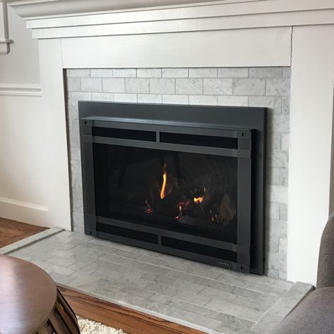 Marble tile fireplace Marble Tile Fireplace, Fireplace Feature, Dark Grey Tile, Fireplace Feature Wall, Tile Fireplace, Fireplace Tile Surround, Cottage Style Homes, Fireplace Remodel, Grey Tiles