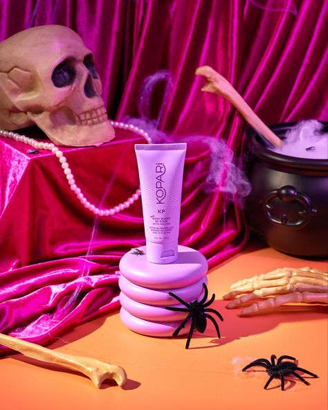 Creative skincare product photoshoot. Halloween photo styling. Purple and orange colour theme. Spiders, bones, skull, pearls and a whitches brew. By Majella Rose Studio Styling ideas, product photography set styling, skincare photography ideas, creative product photography, skincare photoshoot. #productphotography Halloween Theme Product Photography, Halloween Themed Product Photoshoot, Spooky Product Photography, Halloween Product Shoot, Halloween Product Photoshoot, Product Photography Lifestyle, Skincare Product Photoshoot, Halloween Branding, Skincare Photography Ideas