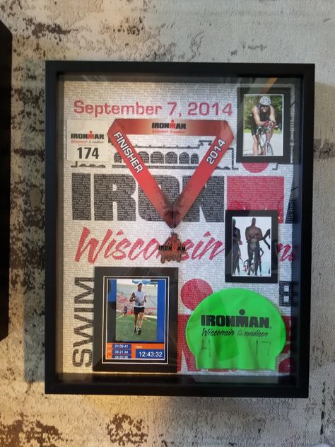 Ironman shadow box was homemade for my husband. Shadowbox from Hobby Lobby ($50 after coupon). Display your ironman, marathon or triathlon race medal, swim cap, race bib and other memorabilia. Simple, easy and way cheaper than having it professionally done. All you need is hot glue gun and a few pins and a vision. Make sure to keep lots of things from race day. Ironman Wisconsin photo collage Ironman Medal Display, Ironman Signs, Race Bib Holder, Captain Marvel Movie, Race Medal Displays, Marathon Medal Display, Framed Memorabilia, Medal Displays, Race Medal