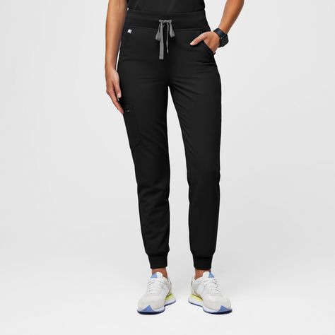 Shop the High Waisted Zamora™ Jogger Scrub Pants 2.0 from FIGS! High waisted with a comfy waistband, slim fit and six pockets. You deserve awesome scrubs. Black Fig, Black Scrubs, Figs Scrubs, Medical Outfit, Blue Scrubs, Trouser Pocket, Medical Scrubs, Black Joggers, Ankle Cuffs