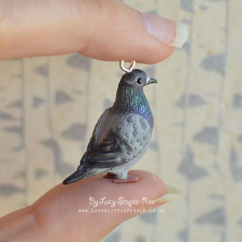 A recent custom pet pigeon pendant. She's a little bit fancy! Check out my Etsy shop to see more - you can find a link in my profile! #folksy #art #handmade #cute #fimo #etsy #notonthehighstreet #craft #handmadeisbetter #bird #polymerclay #premo #sculpey #necklace #handmadejewelry #miniature #ooak #handsculpted #crafting #handmadejewelry #charms #pendant #pigeon #ooak #shopsmall #fancypigeon #handmadejewellery #custommade #gift #handmadegifts #birdsofinstagram #pigeonfan Pet Pigeon, Clay Pigeons, Clay Bird, Cool Pokemon Wallpapers, Bird Carving, Wood Animal, Polymer Clay Animals, Clay Figurine, Polymer Crafts