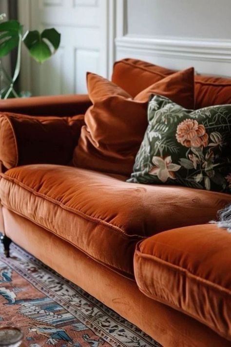 Rust Velvet Sofa Living Room, Rust Lounge Decor, Cinnamon Velvet Sofa, Mustard Velvet Sofa Living Room Ideas, Rust Home Decor Living Room, Rust Velvet Couch, Patterned Couch Living Room, Rust Couch Living Room, Rust Sofa Living Room