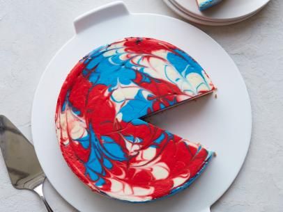 Red, White and Blue Cheesecake Recipe | Food Network Kitchen | Food Network Red White And Blue Cheesecake, Blue Cheesecake, Cookout Desserts, Summer Pie, Vanilla Whipped Cream, Blue Food Coloring, Blue Gel, Whipped Cream Cheese, Blue Food