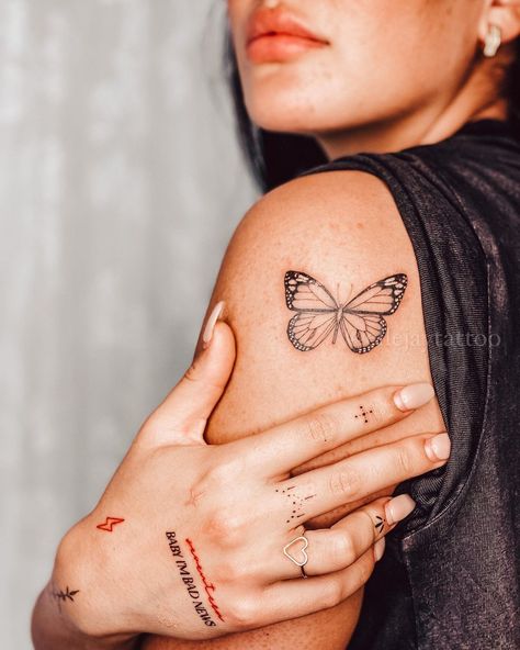 Monarch Arm Tattoo, Black Woman Butterfly Tattoo, Monarch Butterfly Tattoo Shoulder, Monarch Fine Line Tattoo, Monarch Butterfly Tattoo Black And White, Monarch Tattoos, Small Monarch Butterfly Tattoo, Big Butterfly Tattoo, Shoulder Butterfly Tattoo