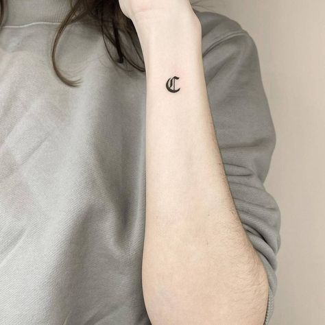 Letter "C" tattoo on the wrist. Letter C Tattoo, Latin Script, Tattoo On The Wrist, Initial Fonts, C Tattoo, Gothic Fonts, Initial Tattoo, Tiny Tattoo, Gothic Tattoo