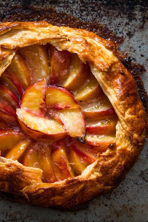 Freeform Peach Pie (Galette) Recipe | Ripe summer peaches don't hold up well in the oven, so it's best to bake them as briefly as possible, which is why I prefer them as an open-faced pie—or galette, as the French would say. Without a pie plate to contend with, the crust bakes so quickly, the peach slices stay wonderfully tender, juicy, and fresh.	  #summerrecipes #seasonal #summerdishes #seriouseats #recipes Open Peach Pie, Open Face Peach Pie, Sweet Pies, Galette Recipe, Summer Baking, Peach Slices, Summer Dishes, Peach Pie, Sweet Pie