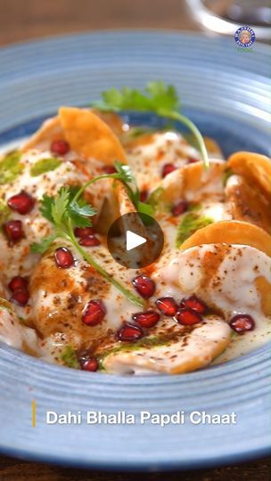 56K views · 806 reactions | Bring the magic of Delhi Street home to your home. Try our Dahi Bhalla Papdi Chaat recipe this weekend. Recipe by Chef Varun Inamdar Dahi Bhalla Chaat Ingredients: How To Make Sweet Curd For Chaat 1 & 1/2 cups Curd 2/3 cup Sugar How To Make Bhalla 1 cup White Lentils (soaked in warm water) 2-3 tbsp Water Salt (as per taste) Water 1 tbsp Hot Vegetable Oil Vegetable Oil (for deep frying) 2 cups Water How To Make Dahi Bhalla Papdi Green Chutney Sweet Tamarind Chutney Cumin Seeds Powder (roasted) Black Salt Red Chilli Powder Pomegranate Kernels Coriander Leaves #RajshriFood #DahiBhallaChaat #ChaatRecipe #AnybodyCanCookWithRajshriFood #StreetFood | Rajshri Food | Rajshri Food · Original audio Dahi Papdi Chaat Recipe, Rangoli Designs Latest, Tamarind Chutney, Chaat Recipe, Green Chutney, Coriander Leaves, Red Chilli, Chilli Powder, Chutney