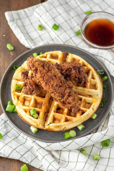 Crispy fried chicken served over homemade bacon and cheddar waffles with hot maple syrup make this recipe a hard breakfast/brunch to top. #friedchickenandwaffles #chickenandwaffles #comfortfood #brunchrecipes | chiselandfork.com Fried Chicken And Waffles Recipe, Chicken And Waffles Recipe, Cheddar Waffles, Best Waffle Maker, Homemade Bacon, Fried Chicken And Waffles, Count Calories, Making Fried Chicken, How To Make Waffles