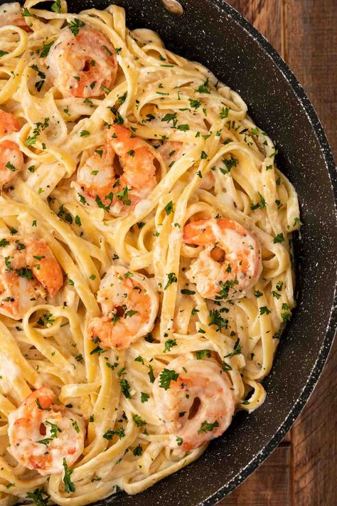 Classic Shrimp Alfredo is a fresh seafood version of alfredo pasta with fettuccine pasta, perfectly seasoned shrimp, and cheesy, creamy sauce. Shrimp And Scallop Pasta, Pasta With White Wine, Scallop Recipes Pasta, Wine Cream Sauce, White Wine Cream Sauce, Scallop Pasta, Shrimp Fettuccine, Seafood Pasta Recipes, Shrimp Alfredo