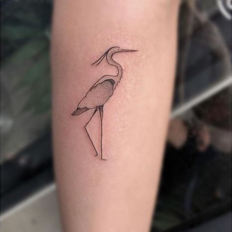 7 Of The Best Tattoo Artists In London | sheerluxe.com Minimalist Crane Tattoo, Blue Heron Tattoo Minimalist, Great Blue Heron Tattoo Simple, Crane Tattoo Minimalist, Blue Crane Tattoo, Ibis Bird Tattoo, Great Heron Tattoo, Small Crane Tattoo, Sea Bird Tattoo