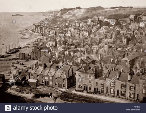 A 19th Century view of closely packed houses in Hastings, a town in East Sussex on the south coast of England. Following the Napoleonic Wars, the town became one of the most fashionable resorts in Britain, brought about by the so-called health-giving properties of seawater, as well as the local springs and Roman baths. Like many coastal towns, the population of Hastings grew significantly as a result of the construction of railway links and the fashionable growth of seaside holidays during the V Roman Baths, Uk Photos, Coastal Town, Napoleonic Wars, Large Picture Frames, The Victorian Era, East Sussex, Coastal Towns, Bw Photo