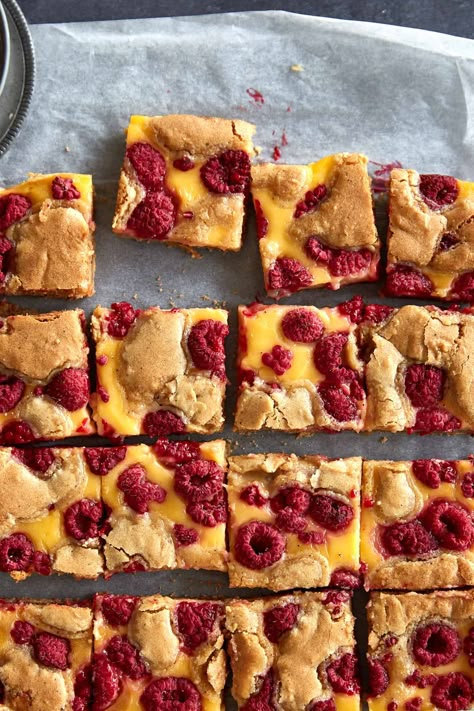 Raspberry Custard Blondies - Izy Hossack - Top With Cinnamon Raspberry Custard, Weekend Baking, Custard Powder, Brownie Bar, Baking Paper, Le Creuset, Custard, Stove Top, Baked Goods