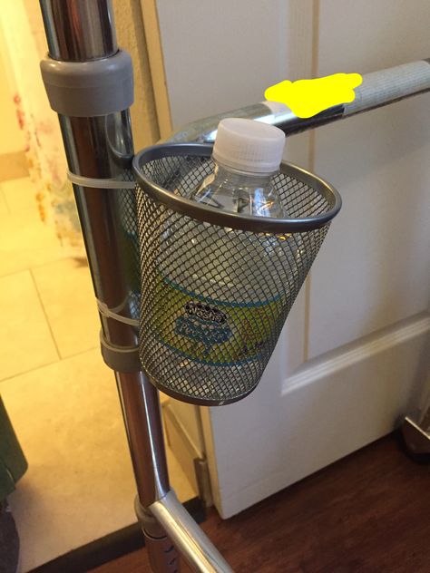 DIY cheap cup holder for a Walker from dollar store container and zip ties. Chair Drink Holder Diy, Walker Decorations Diy, Diy Cup Holder, Walker Decorations Decorating Ideas, Crutches Diy, Crutches Accessories, Walker Accessories, Insulator Lights, Walker Bag