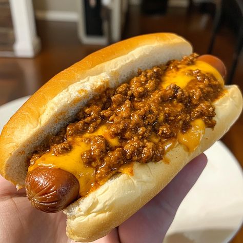 🌭 Chili Cheese Dog Sandwich 🍔 Ingredients: 🌭 4 hot dog buns 🌭 4 hot dogs (beef, turkey, or your choice) 🌶️ 1 can (15 oz) chili (no beans, or your favorite homemade chili) 🧀 1 cup shredded cheddar cheese 🌶️ 1/2 cup diced onions (optional) 🌶️ 1/4 cup sliced jalapeños (optional) 🧴 1 tbsp olive oil (for grilling) 🧂 Salt & pepper to taste Instructions: Prepare the Hot Dogs: In a skillet or on a grill, heat olive oil over medium heat. Add the hot dogs and cook until they are heated through and sli... Chilli Cheese Dogs, Chili No Beans, Chili Cheese Dogs, Chili Dog, Cheese Dog, Sandwich Ingredients, Chili Dogs, Shredded Cheddar Cheese, Homemade Chili