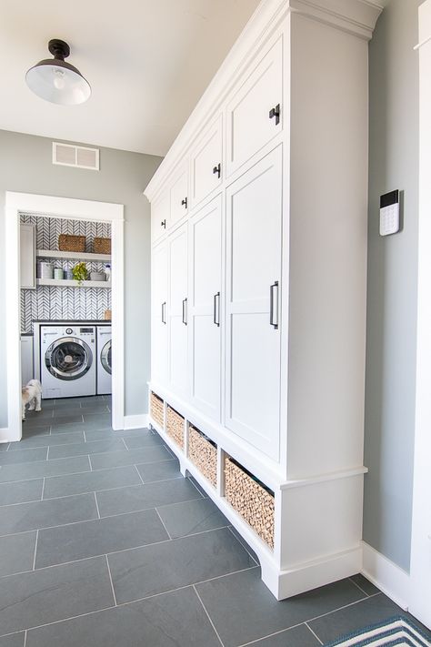 Blue and gray mudroom. Blue slate tile, white lockers and baskets in this lake house mudroom. Blue Mudroom, Studio Mcgee Bathroom, Mudroom Flooring, Gray Painted Walls, Laundry Room/mud Room, Architecture Renovation, Mudroom Lockers, Mudroom Entryway, Mudroom Decor