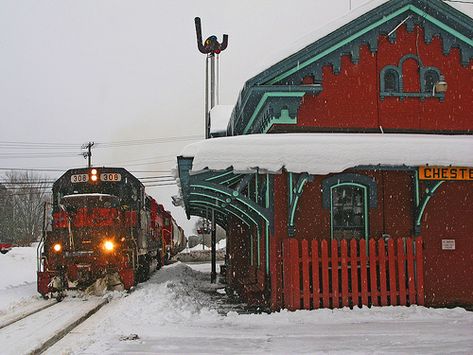 Polar Express - Chester Depot, Vermont  We had just pulled in and I hadn't noticed the train on the other side of the street, ready to roll. When I got in place to take a picture of the station, it started slowly heading out. Good timing. Gosh, it does have that Polar Express thing going on, doesn't it? The station was built in 1852 according to one site I found. Manmade Structures, Railroad Crossing, Train Decor, Penn Station, Train Depot, Old Trains, Trainspotting, Polar Express, Green Mountain