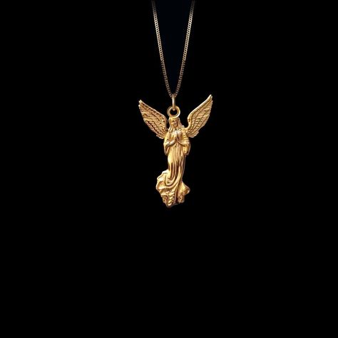 Embrace celestial elegance with our gold Angel pendants, exquisitely crafted in the USA. These divine pieces serve as a symbol of protection, guidance, and purity, perfect for those seeking a heavenly touch in their jewelry collection. 𝗣𝗘𝗡𝗗𝗔𝗡𝗧 𝗜𝗡𝗙𝗢𝗥𝗠𝗔𝗧𝗜𝗢𝗡 This pendant is made of real, solid gold. * Made in USA * Size: 𝗠𝗜𝗡𝗜 * Material: 14k or 18k solid gold * Finish: polished * Height: 1" (27 mm) | *includes the small circle, bail dimensions not included * Width: 0.71" (18 m Mini Angel, Gold Angel, Angel Necklace, Angel Pendant, Solid Gold Chains, Small Circle, Mini Pendants, Box Making, Yellow Gold Pendants