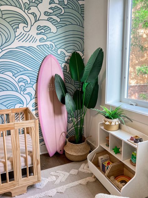 Okay I'm so excited because I'm going to start posting all of my nursery content on my page! Surf nursery, nursery theme, accent wall, fake plant, Montessori toys, Montessori toy storage, nursery decor Follow my shop @Mads&Bougie on the @shop.LTK app to shop this post and get my exclusive app-only content! #liketkit #LTKhome #LTKbaby #LTKbump @shop.ltk https://liketk.it/4g3Nb Surfer Themed Nursery, Surfer Girl Nursery, Hawaii Nursery, Surfboard Nursery, Montessori Toy Storage, Surfer Nursery, Hawaiian Nursery, Toy Storage Nursery, Surfer Room