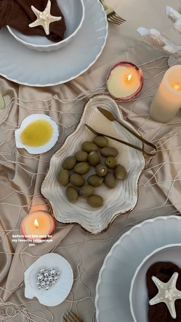 Kimberly Anne on Instagram: "SHARING MY FAVORITE TABLESCAPE OF 2023 : Mermaids + martinis 🍸 🐚🫒 This mermaid-themed tablescape adds a nice touch to events such as bridal showers and summer dinner parties, creating a whimsical atmosphere for your guests to enjoy 🫶🏼" Mermaid Theme Dinner Party, Yacht Bridal Shower Ideas, Ocean Themed Tablescape, Coastal Theme Bridal Shower Ideas, Mermaid Theme Dinner, Seashell Dinner Party, Ocean Dinner Party, Sea Themed Dinner Party, Beach Theme Dinner Party