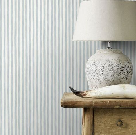 A smart and innocent watercolour stripe brings a charming touch to your walls. Please note This design is a free pattern match. Seen here in the Pastel Blue  White colourway. Neutral Bathroom Wallpaper, Striped Bathroom Walls, Blue Wallpaper Bedroom, Stripe Wallpaper Bedroom, Serena And Lily Wallpaper, Nursery Wallpaper Boy, Blue Stripe Wallpaper, Brown Nursery, Boys Room Wallpaper