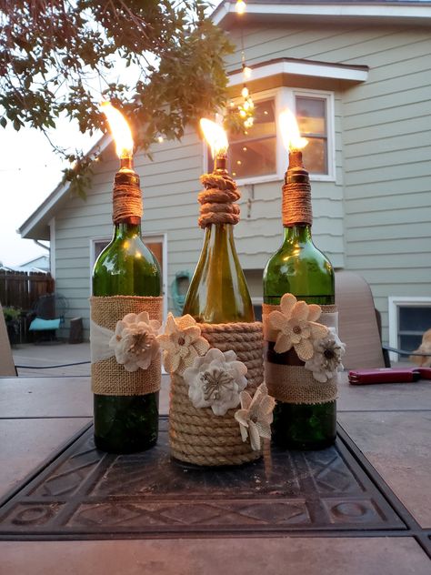 Wine Bottle Torches From Scratch Bottle Tiki Torch Diy, Wine Bottle Citronella Candles, Wine Bottle Tiki Torch Diy, Tiki Torches Diy, Candle Content, Wine Bottle Torches, Bottle Torch, Wine Bottle Garden, Wine Bottle Tiki Torch