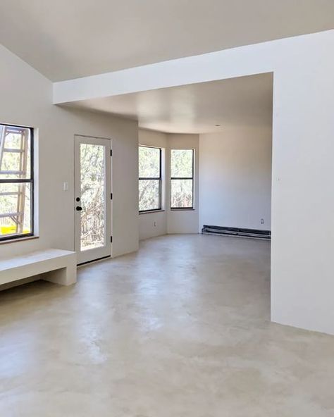 Micro Cement Interior, Cement Screed Flooring, Concrete Floor Baseboard, Polished White Concrete Floors, Cement Floor Interior Design, Epoxy Floor In Kitchen, Concrete Salon Floor, Limewash Cement Floor, Greige Concrete Floors