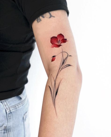 Wrap Tattoos For Women, Wrist Wrap Tattoos For Women, Floral Back Tattoo, Bluebell Tattoo, Tulip Tattoos, Floral Back Tattoos, Tattoos 2024, Magnolia Tattoo, Tulip Tattoo