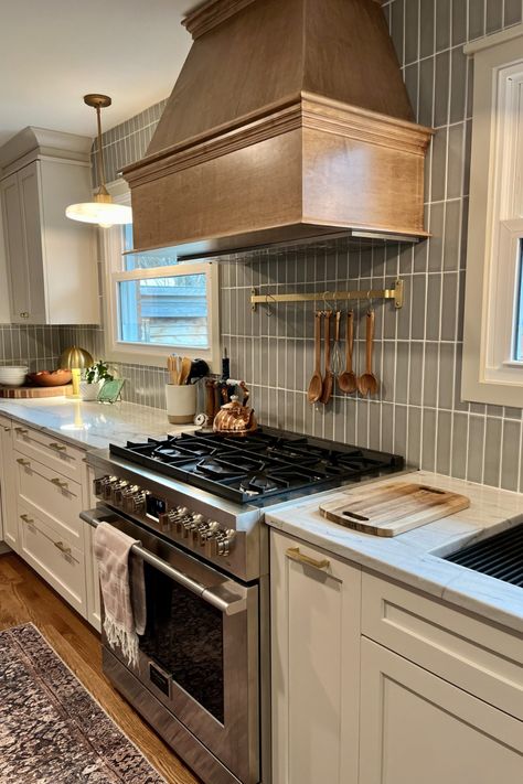 Soft Beige makes a BIG impact in this cozy neutral kitchen by designer Suzanne: stacked gray subway tile provides the contrasting backdrop while the woodgrain hood offers a warm focal point. White And Navy Kitchen, Stacked Cabinets, Gray Subway Tile, Navy Blue Kitchen Cabinets, Beige Kitchen Cabinets, Kitchen Cabinets Grey And White, 10x10 Kitchen, Navy Kitchen, Beige Cabinets