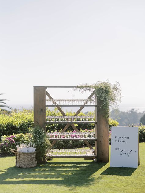 Fun wedding idea, grab a glass, champagne toast, champagne glasses, champagne wall, wedding favors, reception ideas, unique champagne tower wedding inspo, cocktail hour, fun drink stand, classic California wedding, modern wedding design, Montecito Club, Santa Barbara Champagne Stand Wedding, Champagne Wall Wedding, Champagne Stand, Champagne Tower Wedding, Enchanted Theme, Modern Wedding Design, Drink Display, Champagne Wall, Drink Stand