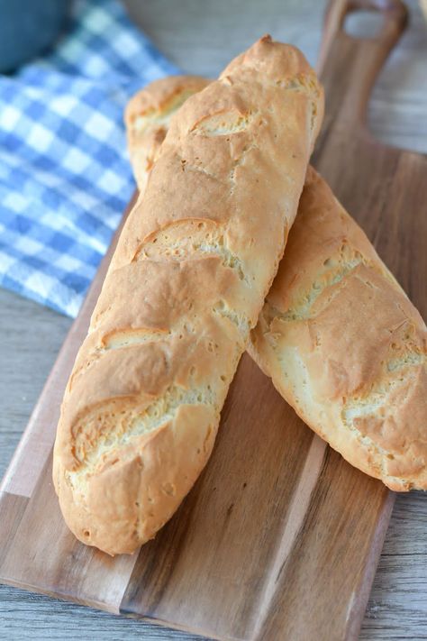 You'll love how easy it is to make this gluten-free French bread. It features a beautiful golden crust with a fluffy inside, filled with the perfect amount of airy bubbles to hold butter. This recipe is sure to become your family's go-to for a fresh, delicious loaf of gluten-free bread. Gluten Free French Bread Easy, Gluten Free Peasant Bread Recipe, Gluten Free Sourdough French Bread, Homemade Bread Gluten Free, Gluten Free French Bread Recipe, Bread Maker Gluten Free Bread Recipe, Gluten Free Hoagie Rolls, Gluten Free Bread Bowl, Gluten Free Sub Rolls