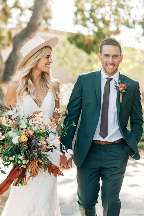 Matching groom attire with your gown and wedding style has never been so easy. From dusty rose groom suits to hunter green options, we are seeing every color, pattern and cut under the sun. Especially where Stitch  Tie enters the arena! Today, we partnered with this online tuxedo and suit rental company to share some style inspiration for every type of wedding mood. From elegant black tie to laidback beach fete, we have got you covered, friend. #ruffledblog Beach Wedding Groom, Green Wedding Suit, Mens Wedding Suits, Mens Wedding Attire, Groom Wedding Attire, Groom And Groomsmen Attire, Wedding Suits Groom, Wedding Blue, Wedding Groomsmen