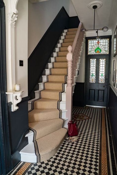 Obsessed with the pink bannister and stunning stair runner in the beautiful hallway of Alex Stedman, The Frugality