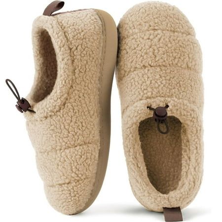 Discover the perfect blend of comfort and versatility with the Ravelier Women's Camper Moc Slipper with Adjustable Drawstring. Featuring a stylish and practical design, these slippers offer a customizable fit with the adjustable drawstring. The soft and cozy interior ensures all-day comfort, while the durable rubber sole provides traction for both indoor and outdoor use. Whether you're relaxing at home or running errands, these camper moc slippers deliver exceptional comfort and style. Upgrade y