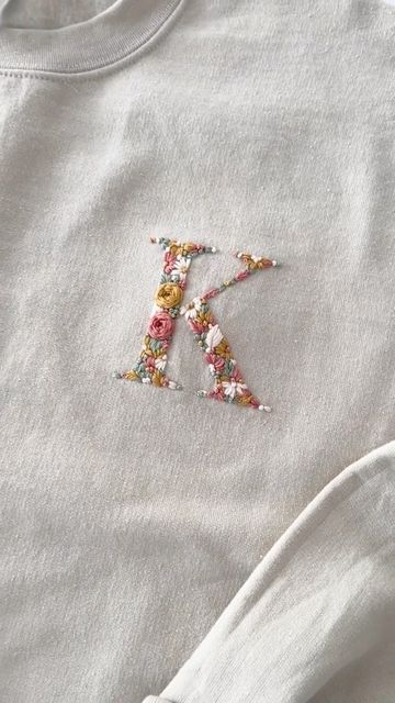 Embroidery Initials Letters On Hoodie, K Letter Embroidery Design, Embroidery Initials Letters On Clothes, Embroidered Cross Design, Initial Embroidery Letters, Embroidery Initials Letters, Letter K Embroidery, Embroidered Baby Clothes, Hoodie Art