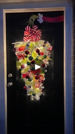 412K views · 93K reactions | @dollartree Christmas tree wreath 
@hobbylobby Lobby ornament,ribbon & lights
@walmart door hook

I can’t remember the guys profile i seen this on but i Loved this idea so thank you!! 

#christmas #wreath #diy | Nicole Jay Grinch Door Ideas, Grinch Wreath Diy, Christmas Tree Wreath Diy, Ribbon Lights, Upside Down Christmas Tree, Christmas Wreath Diy, Ornament Ribbon, Large Christmas Wreath, Artsy Crafts