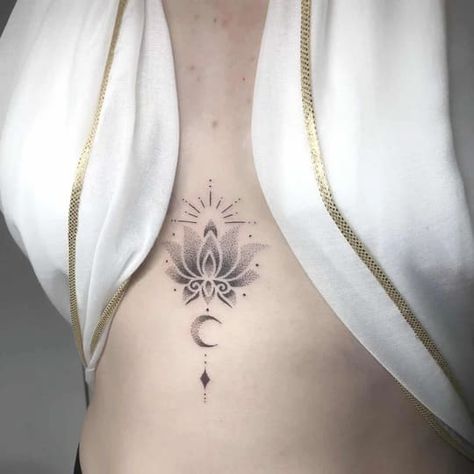 30 Amazing Lotus Flower Tattoo Ideas That You'll Love Lotus Flower Chest Tattoo Female, Flower Tattoo On Chest, Lotus Blossom Tattoos, Lotus Flower Tattoo Wrist, Mandala Chest Tattoo, Lotus Flower Tattoo Ideas, Black Lotus Tattoo, Flower Neck Tattoo, Tattoo On Chest