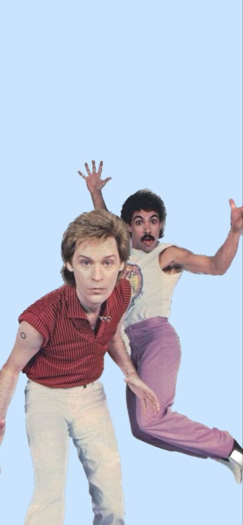 Darryl Hall and John Oates posing for a photo against a solid blue background Darryl Hall, Hall Oates, Hall And Oates, 1980s Aesthetic, 1970s Aesthetic, John Oates, Hall & Oates, Daryl Hall, Sixties Fashion