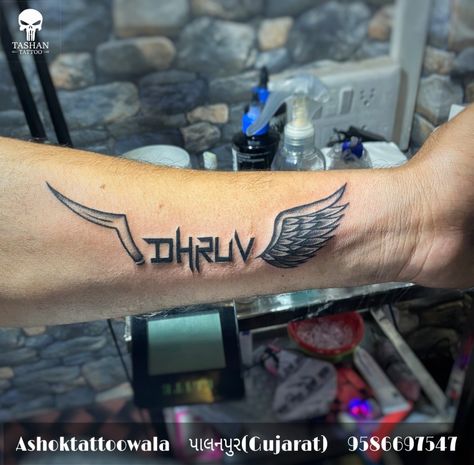 Dhruv tattoo Dhruv Name Tattoo, Dhruv Name, Wing Tattoos, Baby Tattoo Designs, Baby Tattoo, Letter Tattoo, Name Tattoo Designs, Wings Tattoo, Baby Tattoos