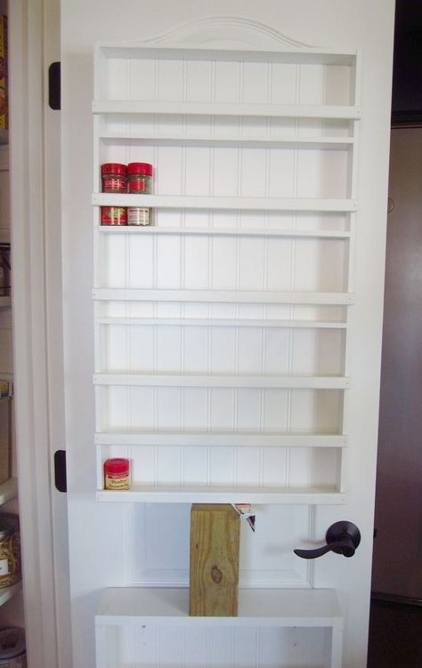 DIY door mounted spice rack | Home Staging In Bloomington Illinois Roll Out Pantry, Spice Rack On Pantry Door, Pantry Spice Rack, Door Mounted Spice Rack, Pantry Door Storage, Chicago Kitchen, Door Spice Rack, Pantry Door Organizer, Diy Spice Rack