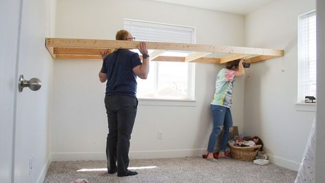 Are you struggling with the small bedroom blues like we were? We needed to figure out how to comfortably fit our two girls into a small bedroom, and I think you might be interested to find out how we solved our space issue. Before, we tried out this loft bed from Amazon, but it just didn't work well and took up too much floor space. I came to the conclusion that the only way to get the most out of this space, was to customize a loft bed for the bedroom. First, we measured the total Diy Loft Twin Bed, Loft Bed Over Window, Bed Inside Closet Ideas, Built In Loft Bed, Bed Infront Of Window, Bedroom Blues, Loft Bed Ideas For Small Rooms, Diy Built In, A Loft Bed