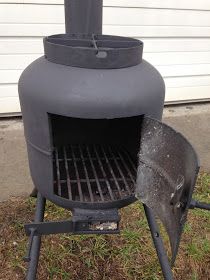 I made this small wood stove from a 20lb propane tank. I added a cross brace on the top to place a pan for cookin... Propane Wood Stove, Diy Wood Burning Stove, Propane Tank Fire Pit, Propane Tank Ideas, Gas Bottle Wood Burner, Diy Wood Burning, Small Wood Stove, Tiny Wood Stove, Wood Burning Heaters