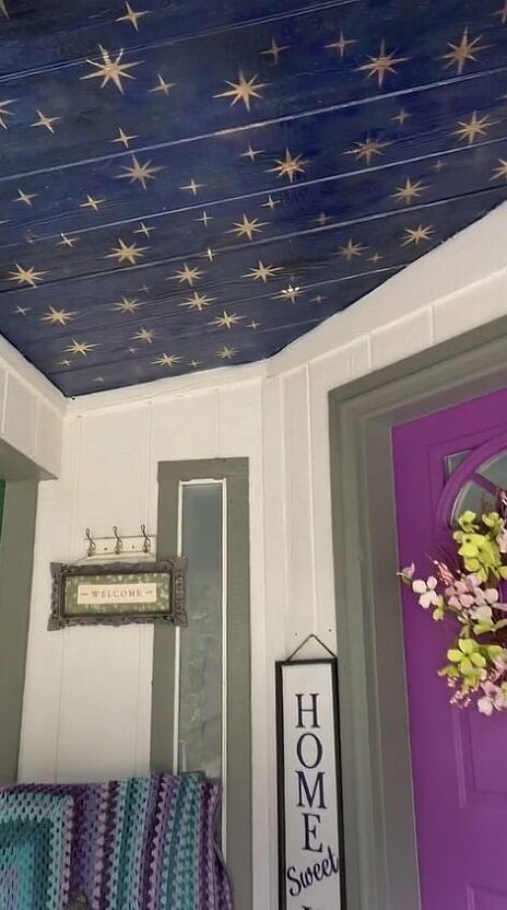 I painted a celestial mural on the ceiling of my front porch. This was inspired by the Wizarding World of Harry Potter at Universal Studios in Orlando. At one Wiseacres Wizarding Equipment in Diagon Alley there is a beautifully painted celestial mural. I have been looking for the perfect spot in my home to do something similar. I decided to do paint one on the ceiling of my front porch. This is the porch before. It was plain white. The siding is made of vinyl that has a texture on i… Ceiling Painting Ideas Murals, Gold Leaf Star Ceiling, Slanted Ceiling Mural, Whimsigoth Ceiling, Statement Ceiling Bedroom, Celestial Ceiling Diy, Starred Ceiling, Witchy Ceiling Decor, Painted Star Ceiling