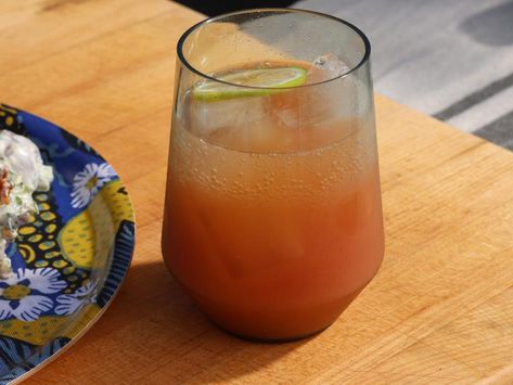 Peach on the Beach Cocktail Recipe | Michael Symon | Food Network Michael Simon Recipes, Peach On The Beach, Merry Birthday, Beach Drink, Booze Cruise, Michael Symon, Happy Drink, Punch Drinks, Beach Cocktails