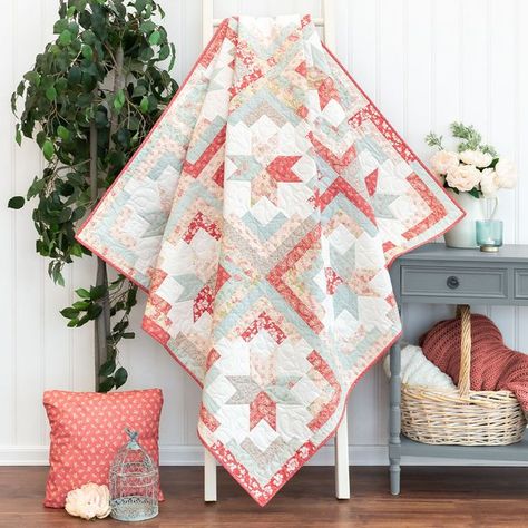 Shabby Fabrics on Instagram: "💗 Snuggle up with the Cozy Cabin Quilt in the Bliss fabric collection. Vintage florals meet soft pink, blue and cream colors that pair happily with the log cabin and star elements to yield a beautiful throw. Shop the Kit in our link in bio! Pattern: @modernlymorgan Fabrics: @threesistersquilt for @modafabrics #shabbyfabrics #quiltshop #quilter #quilting #sewing #quilters #quiltinglove #ilovequilting #quiltingproject #sewingpattern #modafabrics #showmethemoda #madewithmoda" Cozy Cabin Quilt, God And Country Quilt Pattern, Queen Size Quilt Pattern, French Country Quilt, Quilt Kits For Sale, Quilt Settings, Strip Quilt, Log Cabin Quilt Pattern, Cottage Quilt